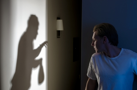 Resident comes home to find robber breaking and entering